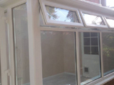 Exterior of a white uPVC lean to conservatory