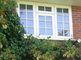 Exterior view of triple pencil ogee profile uPVC double glazed window